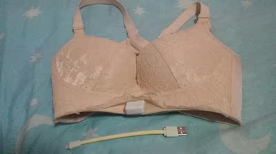 充电快，内衣里面设计像小点的纹理，按摩时感觉热热的，随时随地都能按摩，晚上睡觉按摩，走路按摩。