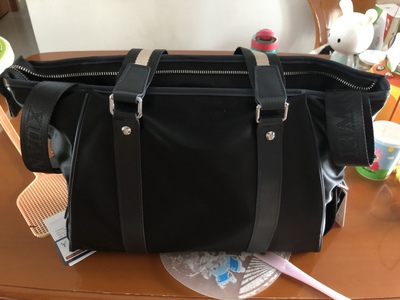 讨论轩唯男包怎么样,质量假不假呢，亲身使用三个月感受揭秘