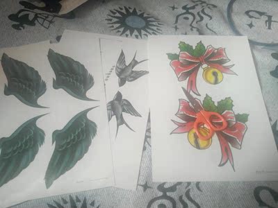 还送了小剪刀，纹身有点不清晰，晕染开的感觉