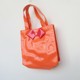 Taote counter ຂອງແທ້ມີຂໍ້ບົກພ່ອງ Qingxia ຂະຫນາດນ້ອຍ PVC ສີສົດໃສເຄິ່ງໂປ່ງໃສຖົງ handbag 9019
