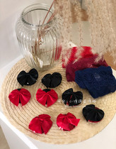 Passion for teasing and flirtation with a butterfly knot brightly lit pieces of blood dripping with breast paste with an adult couple romance items