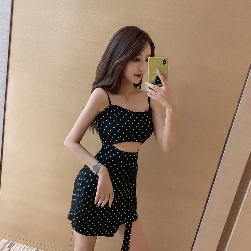 Váy chấm bi 2021 mùa hè sexy rò rỉ bụng cao eo không thường xuyên túi hông sling váy ngắn hộp đêm quần áo phụ nữ - Váy eo cao