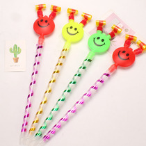 Childrens big laughs face blow and blow a dragon whistle birthday party Weeks with a small gift to stall a toy stock source