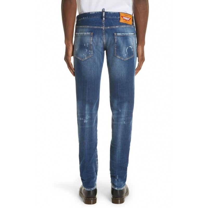 distressing and a unique, timeworn wash define these slim-cut