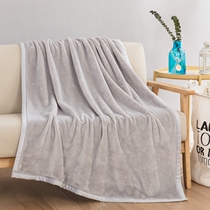 Little blanket with a small blanket cover on a sofa with a small blanket with a leg cover in winter office