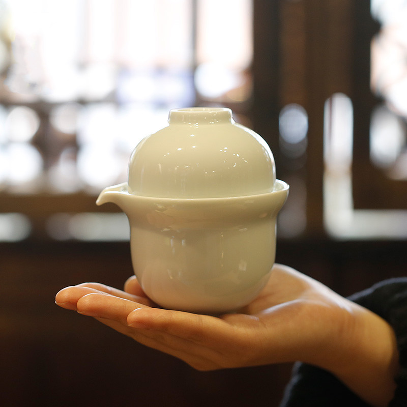 . Poly real boutique scene. Crack cup a pot of two cups of tea set household jingdezhen ceramic portable travel work