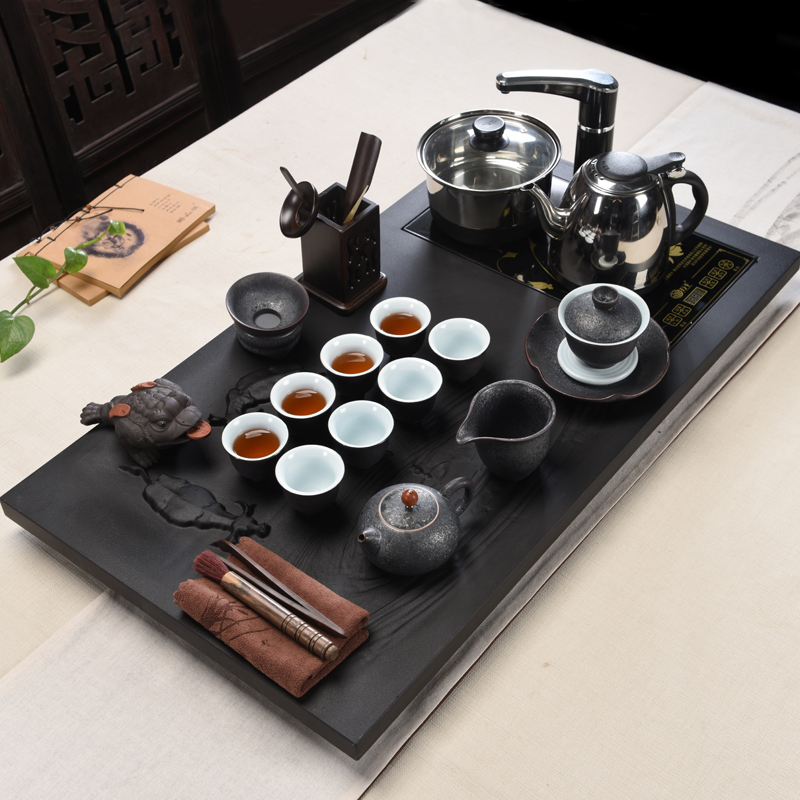 Porcelain god black stone tea suit household ceramic tea sets tea sea induction cooker sharply large stone, stone tea tray