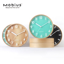 MOBIUS log silent clock non-perforated wall clock personality creative Nordic art clock ins Wind