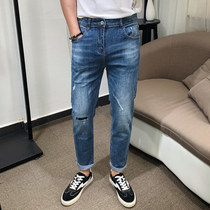 Korean slim feet jeans mens hole Tide brand Joker casual trousers 2021 new mens simple pants