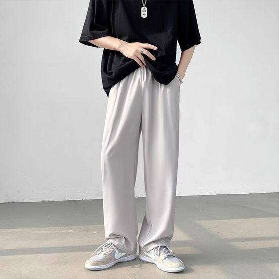 Summer thin ice silk pants for men with a straight tube and a sporty and casual look. Versatile Korean version of trendy nine point cool quick drying pants Summer thin ice silk pants for men with a straight tube and a sporty and casual look. Versatile Korean version of trendy nine point cool quick drying pants