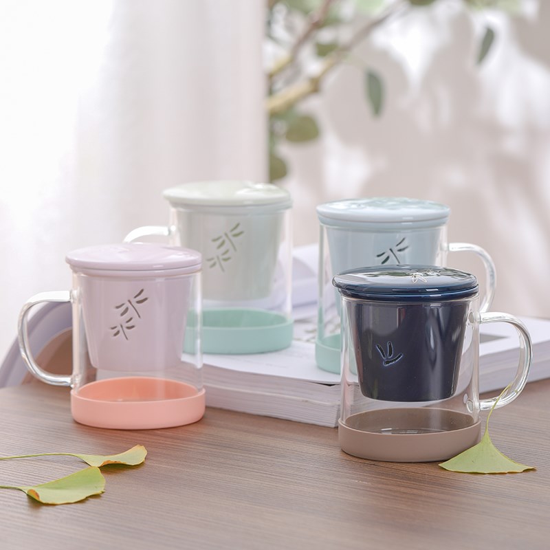 Creative tea separation of the ceramic filter tea glass tank cover household contracted character mark cup with cover