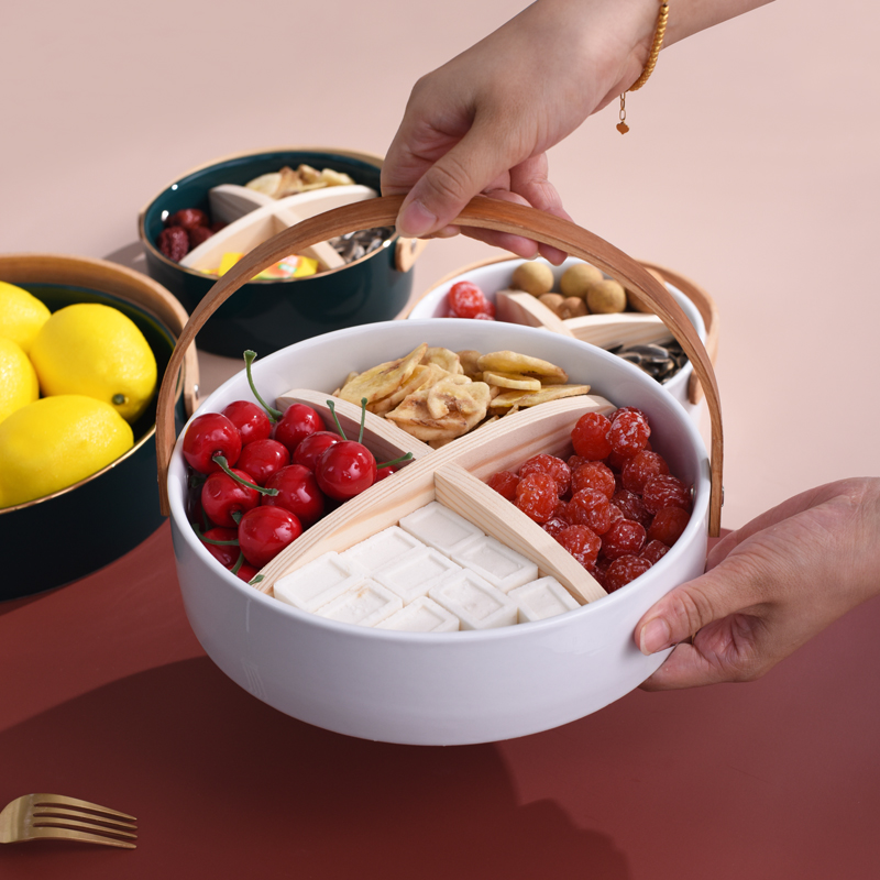 The Nordic ceramic portable fruit bowl creative living room table storage disc frame dried fruit snacks tea table plate decoration