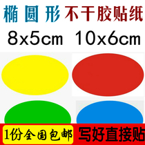 Handwritten large number of oval square labels postured with adhesive sticker i.e. when it is time to stick clothes shelving students chest ID sticker