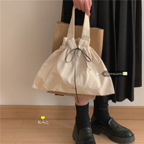 2021 New Korean version of simple retro casual Hand bag womens bag Joker student Net red niche canvas bag tide