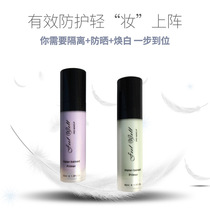 The special psychic of the makeup artist in the shadow building is light to repair the face and isolate the milk