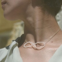 saskia diez pearl butterfly knot infinity Necklace with the same German designer-exclusive