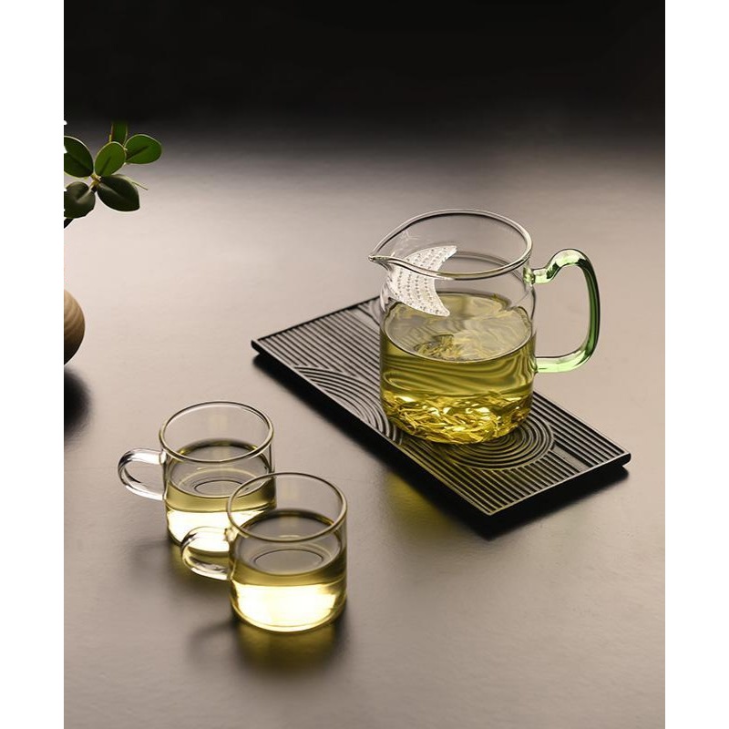 ) a whole glass fair keller heat thickening points tea, green tea set tea service crescent filter and a cup of tea