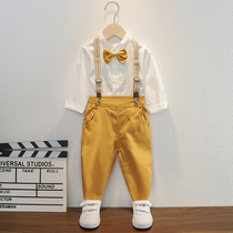 Boy gown with handsome catch of the week acting out of the childs age and a little suit Inn Wind Summer Playboy host