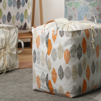 Accept the bag and sort the bag the large house of clothing the moving bag with the quilt and put the clothes and quilt