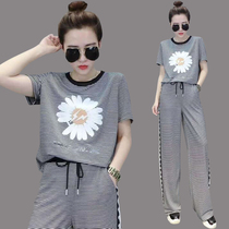 Europe station 2021 summer new large size leisure sports suit womens fashion stripe stitching small Zou Ju two-piece set