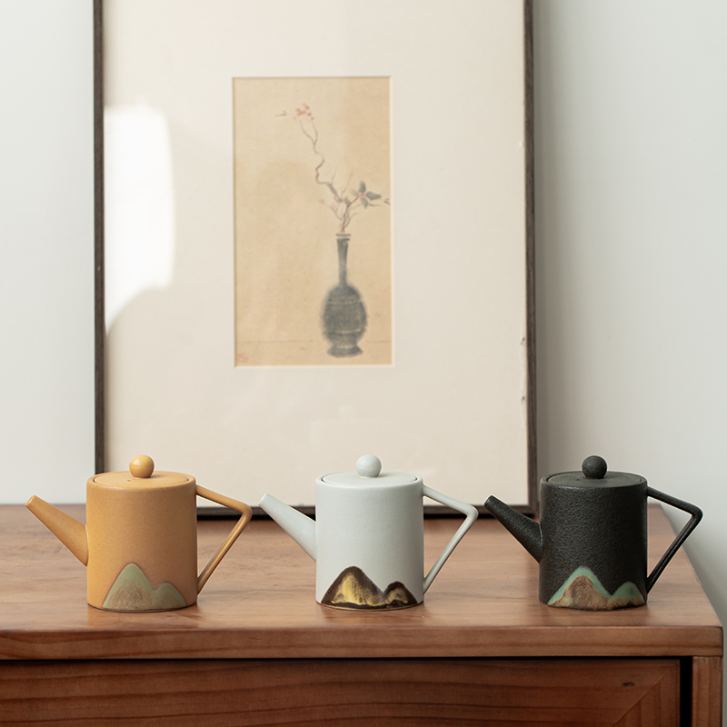 Distant mountains thick some ceramic teapot single pot of Japanese porcelain kung fu tea set one small white pottery teapot with a family of black pottery teapot