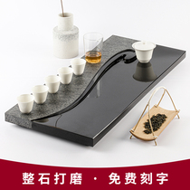 Wujin stone tea tray household drainage tea table natural whole black gold stone head modern simple creative size tea sea