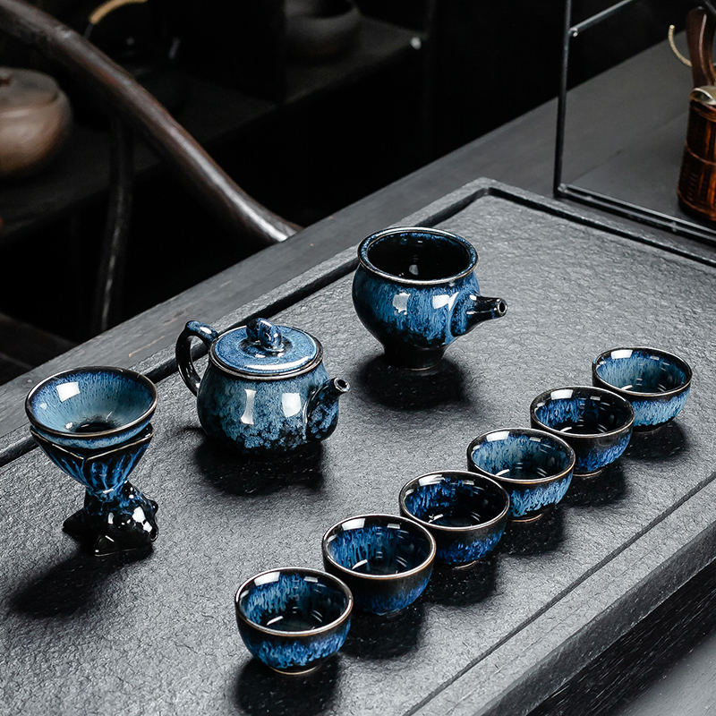 A complete set of ceramic up built light tea set domestic kung fu tea red glaze, the lazy millstones automatic tea