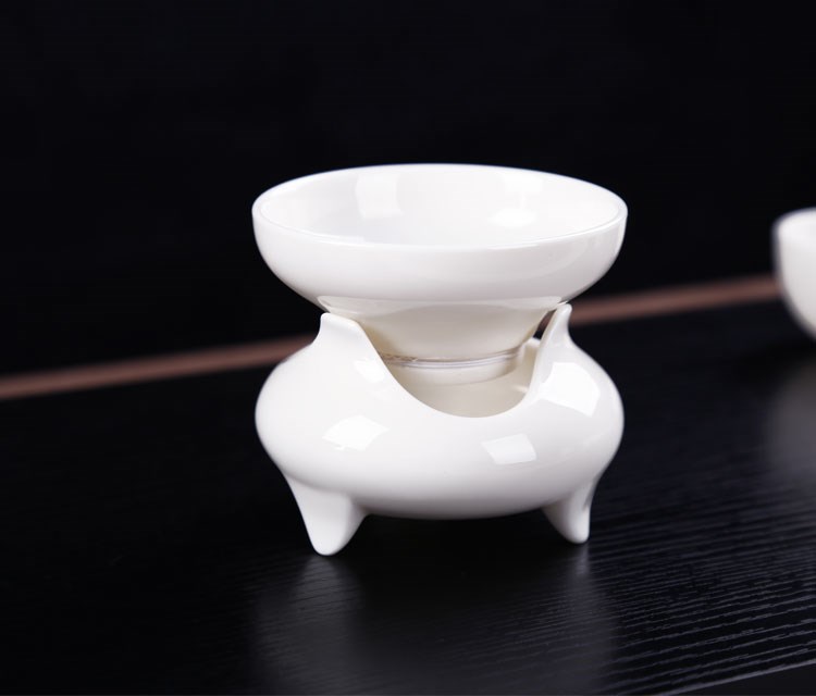 Dehua white porcelain single hook tea ceramic filtration tea set spare parts mesh tea tea strainer base isolation