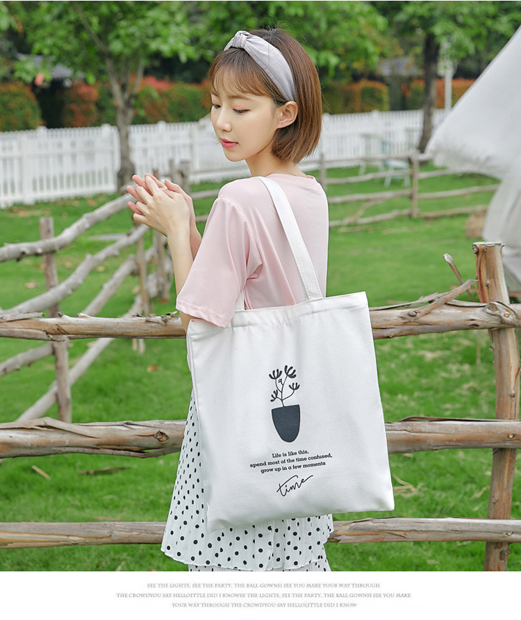 用日系单肩白色女大容量帆布包布袋时尚挎斜韩版文艺学生百搭清新