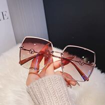 Sunglasses womens 2022 new frameless brown sunglasses high-end sense of plain makeup street shooting sunshade glasses ins