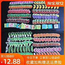 First grade mathematics teacher with teaching aids digital magnets Primary school students with a full set of kindergarten magnetism