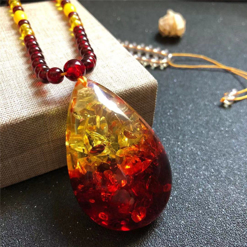 波罗的海二代琥珀蜜蜡爆花珀水滴吊坠有荧光男女款挂件项链毛衣链