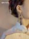 새로운 중국 스타일 Nichempa Cheongam Hanfu Crescent Tassel Earrings Light Luxury High-End Earrings Chinese Style Horse Face Earing Accessories 새로운 중국 스타일 Nichempa Cheongam Hanfu Crescent Tassel Earrings Light Luxury High-End Earrings Chinese Style Horse Face Earing Accessories