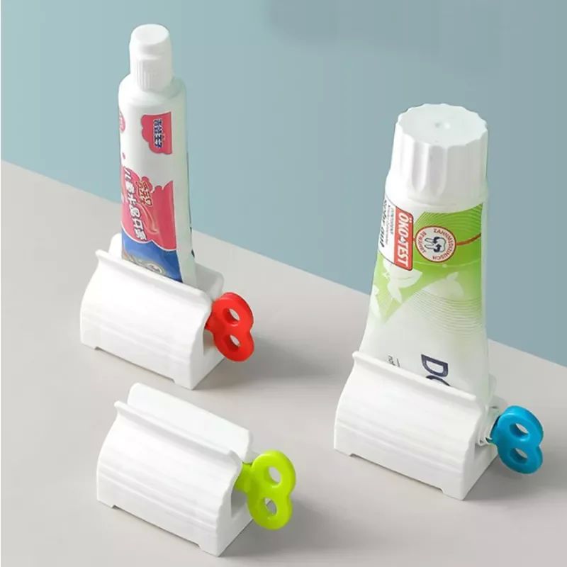 Mini Rolling Tube Toothpaste Squeezer Dispenser Seat Holder -