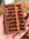 Hainan Huanghuali Wood 7 단계 작은 주판 9*6*1 cm, 큰 건강 Hainan Huanghuali Wood 7 단계 작은 주판 9*6*1 cm, 큰 건강
