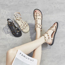 2021 summer new rivet sandals female fairy wind net red ins tide Korean version wild flat open-toed Roman shoes