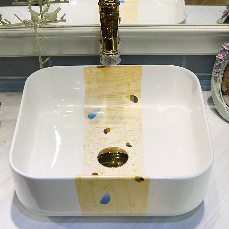 Gold cellnique square on the sink water basin European household ceramics washs a face of the basin that wash a face plate of one meter sunshine