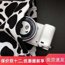 Black-and-white cow canvas corset pocket camera bag