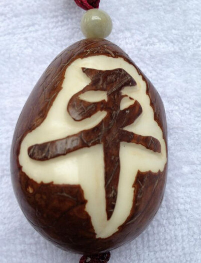 象牙果菩提原料原籽雕刻按个三角形佛头三通diy白玉菩提子佛心果