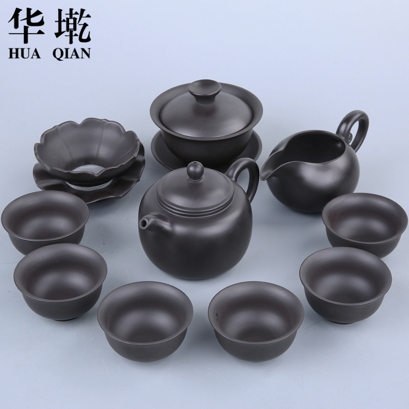 China Qian violet arenaceous kung fu tea set suit household black pottery yixing manual it a complete set of tea cups to wash the tea taking