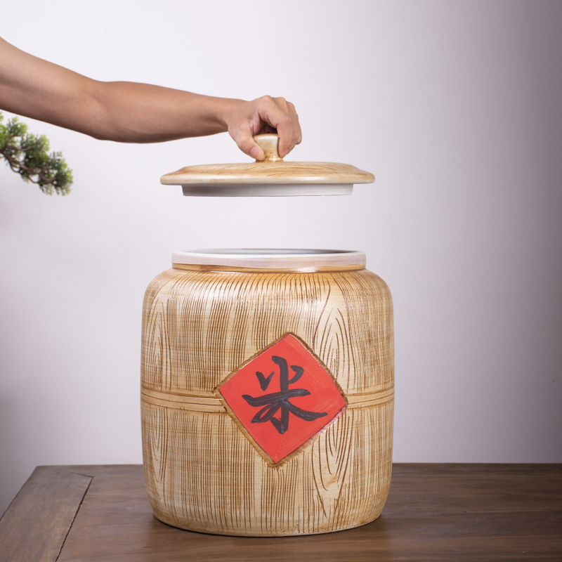 Jingdezhen ceramic barrel imitation solid wood with cover ricer box 10 jins 30 jins of 50 kg of flour barrels household seal storage tank