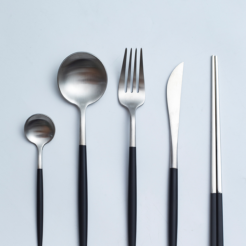 Black and white and gold and silver wire drawing of stainless steel tableware suit beefsteak coffee spoon dinner knife and fork spoon, chopsticks combination