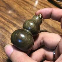 Authentic golden silk Nanmu ebony gourd toy Wen play snuff bottle handle piece Golden silk Nan gloomy wood ornament heavy