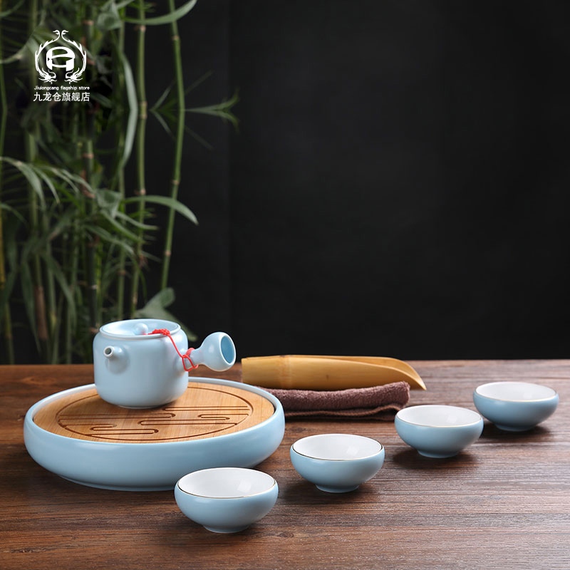 Jingdezhen kung fu tea set ceramic small household small tea tray teapot tea cups of a complete set of I and contracted