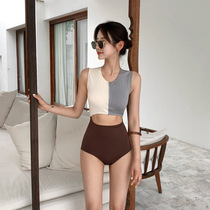 2019 Korean version of the new retro color front and rear hollow zipper womens one-piece swimsuit tight open waist hot spring swimsuit