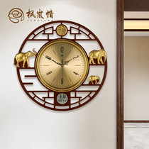 High-end new Chinese wall clock living room home fashion Chinese style atmospheric simple wooden silent round quartz clock