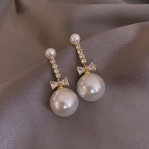 A DHepburn ~ elegant pearl pendant earrings Korean temperament bow Net red ear nail small fragrant wind ear ornaments
