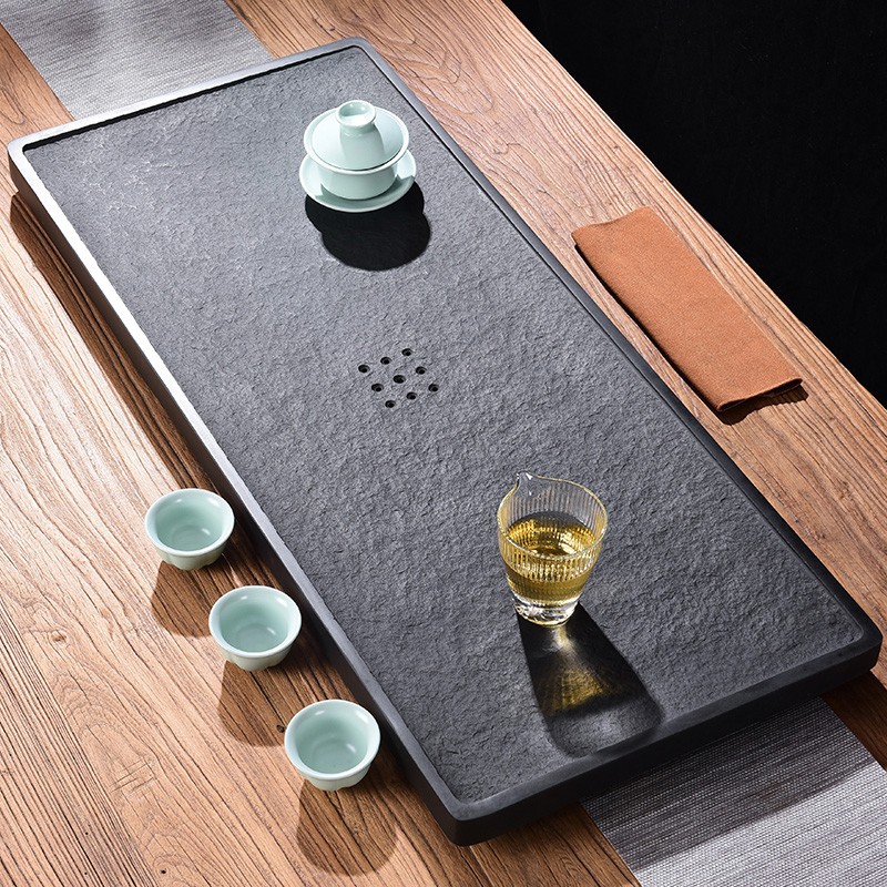 Tao blessing sharply stone tea tray was home drainage contracted sitting room the whole piece of black gold stone tea tray tea table can be customized