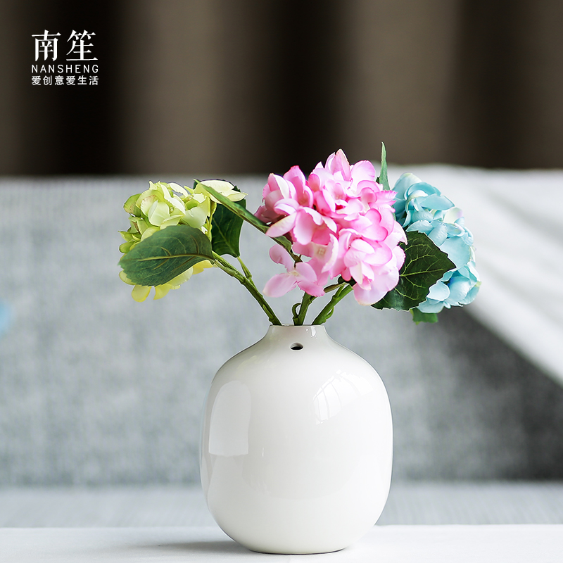 Nan sheng mesa of I and contracted household act the role ofing is tasted furnishing articles white ceramic vase simulation flowers, dried flowers, floral outraged