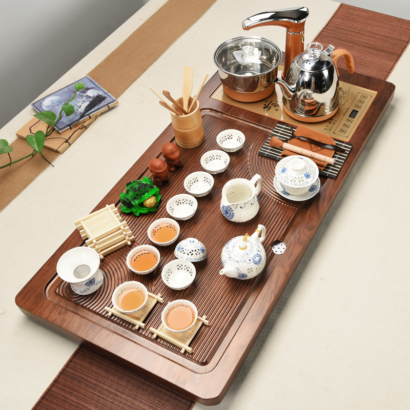 ZongTang tea set household automatic four unity of a complete set of induction cooker kung fu tea tray was solid wood, purple sand tea taking